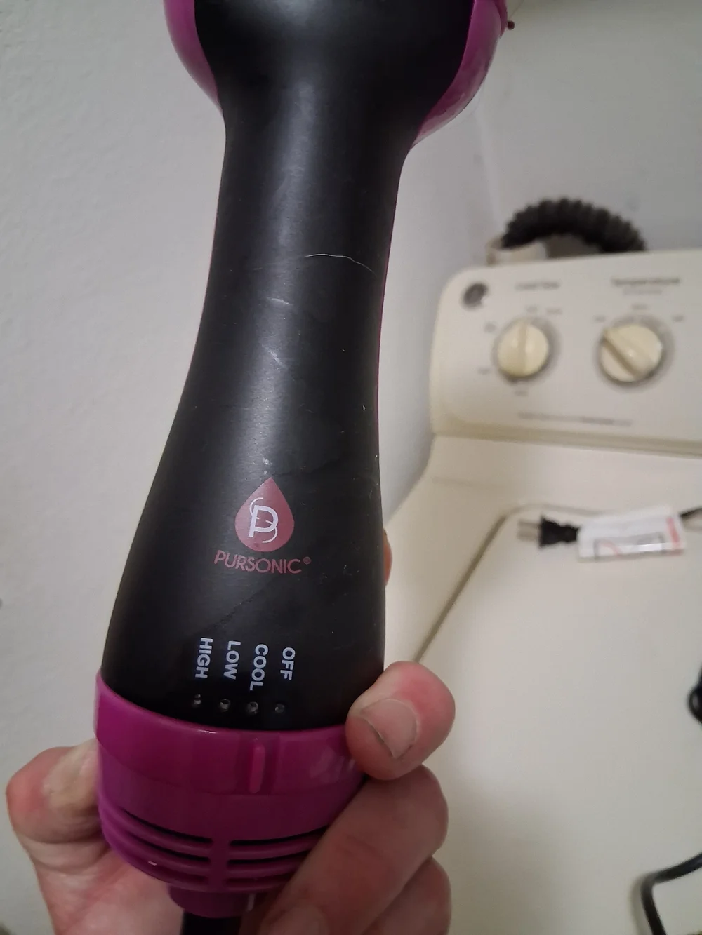 Pink and Black Hot Air Hair Brush Dryer And Various Styling Items